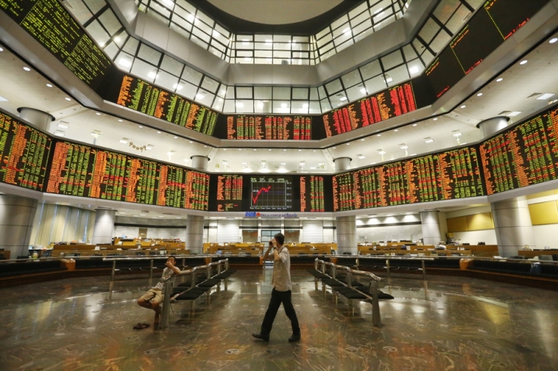 Bursa Malaysia remains lower at mid-day
