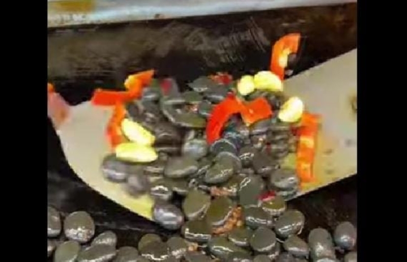 Stir-fried river pebbles costing RM10 a craze in China (VIDEO) | Malay Mail