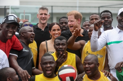 In Nigeria, Prince Harry promotes Invictus Games for veterans Britain's Prince Harry, Duke of Sussex, and Britain's Meghan, Duchess of Sussex, pose for a photographs with players ahead of an exhibition sitting volleyball match at Nigeria Unconquered, a local charity organisation that supports wounded, injured, or sick servicemembers, in Abuja on May 11, 2024 as they visit Nigeria as part of celebrations of Invictus Games anniversary. — AFP pic