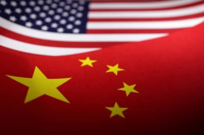 China to send two young giant pandas to the US later this year US and Chinese flags are seen in this illustration taken, April 24, 2024. — Reuters pic