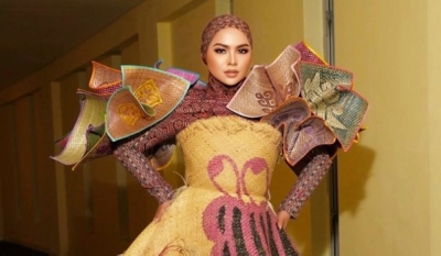 Designer Melinda Looi collaborates with Penan artisans on singer Aina Abdul’s rattan dress The gown was specially created by reknowned fashion designer Melinda Looi, in collaboration with rattan artisans from the Penan ethnic group in Sungai Tutoh village, Baram, Sarawak. — Picture courtesy of Instagram/ainabdul