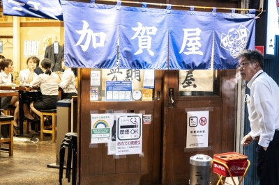 Tourists get taste of old Japan at hidden 'snack bars' Snack bars are cosy, retro establishments found across Japan, often crammed into small buildings and equipped with karaoke systems that echo late into the night. ― AFP pic
