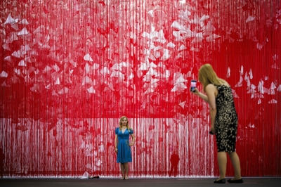 Bellwether Basel art fair gives lift to sluggish global market A visitor takes a picture of ‘The Extended Line’ 2023/2024, by Japanese artist Chiharu Shiota displayed at the Unlimited sector of Art Basel fair for Modern and contemporary art, in Basel June 11, 2024. — Valentin Flauraud/AFP pic