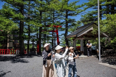 Japan seeks more visitors despite overtourism woes People visit the Komitake shrine near the Fuji Subaru Line 5th station, which leads to the popular Yoshida trail for hikers climbing Mount Fuji, at Narusawa, Yamanashi Prefecture on June 19, 2024. ― AFP pic