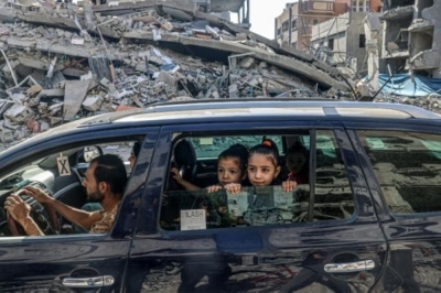 AFP photographer Said Khatib wins Spain prize for Gaza photo Khatib was presented with the award for a picture of two children looking through the window of a car driving past rubble in Rafah in the southern Gaza Strip. — AFP pic/Said Khatib
