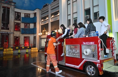 Adulting 101: Seoul’s KidZania helps jobseekers play their way to a new career Visitors role-playing as firefighters during an adult-only event at KidZania, a children’s job experience theme park, in Seoul June 28, 2024. — AFP pic