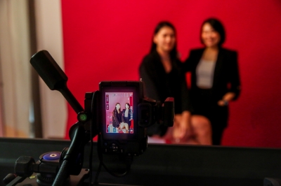 Ready to jump on the AI selfie studio bandwagon? Here’s how (VIDEO) Co-founders of Fiu Studio Asaki Yok and Shallee Lee smile for the camera in Petaling Jaya July 19, 2024. — Picture by Choo Choy May