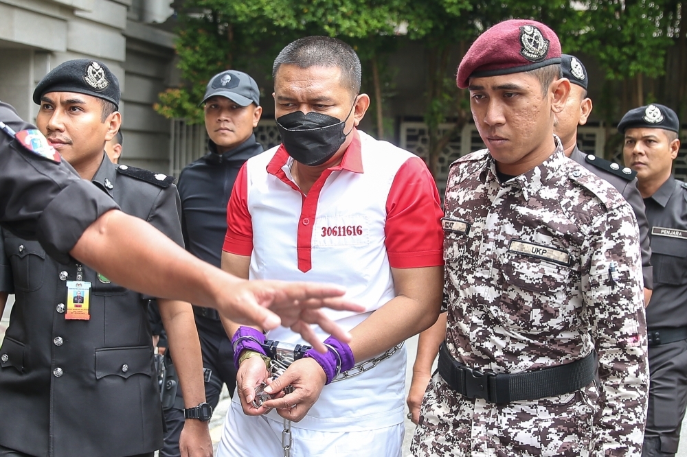 Altantuya’s convicted killer Azilah avoids death penalty as Federal Court reviews sentence to 40 years and 12 strokes of cane Former police commando Azilah Hadri is pictured after the Federal Court decided to replace his death sentence with 40 years of imprisonment and 12 strokes of the cane in Putrajaya October 10, 2024. — Picture by Yusof Mat Isa
