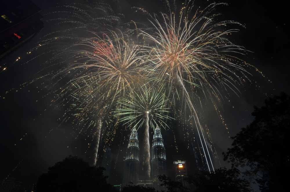 Permit to party: Kelantan mandates licence for New Year’s celebrations, RM20,000 fine or jail for violators File picture of fireworks exploding over Kuala Lumpur City Centre to usher in the New Year on January 1, 2019. Kelantan Local Government, Housing, Health, and Environment Committee chairman Hilmi Abdullah said that applications must be submitted in advance, with no allowances made for last-minute requests. — Picture by Shafwan Zaidon