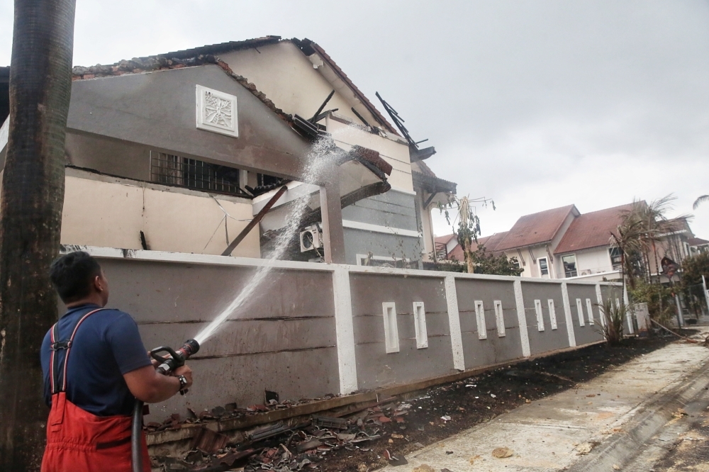 Puchong pipeline blaze almost contained, 190 homes and 159 vehicles damaged, says Fire and Rescue Dept A view of the affected area at Taman Harmoni in Putra Heights after the gas pipeline fire April 1, 2025. — Picture by Choo Choy May