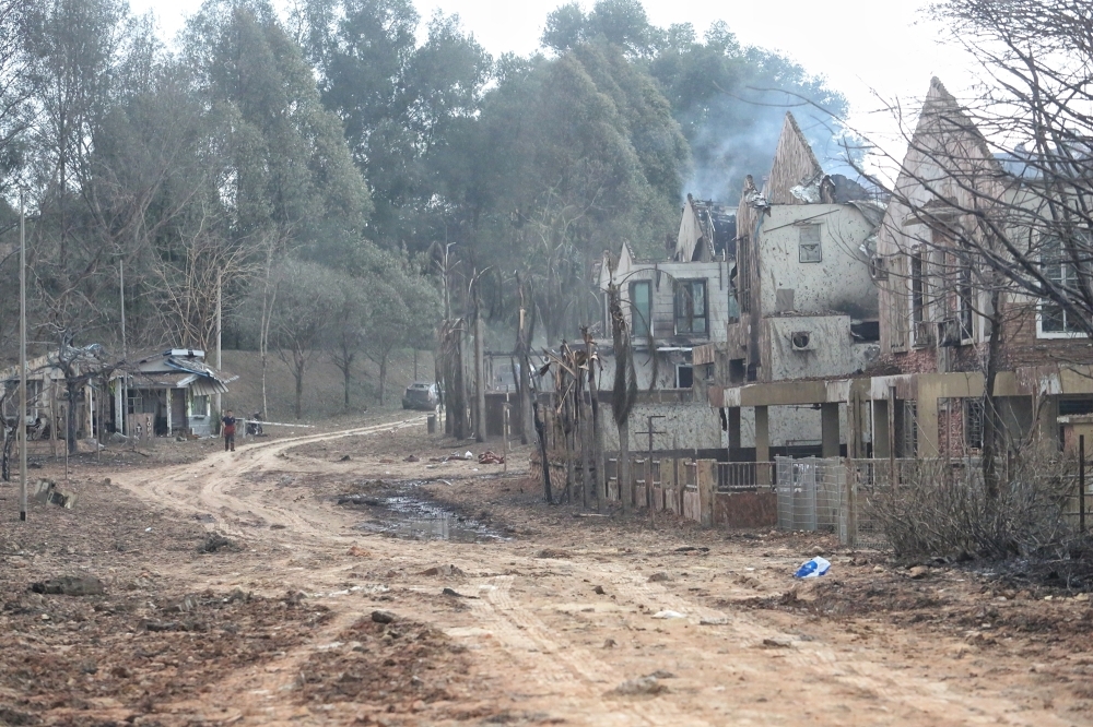 Chery to lend 50 cars to fire-hit residents of Putra Heights, says Selangor exco Houses and cars seen burnt after a gas pipeline fire at Taman Putra Permai 1, Putra Heights, Subang Jaya, yesterday. — Picture by Choo Choy May