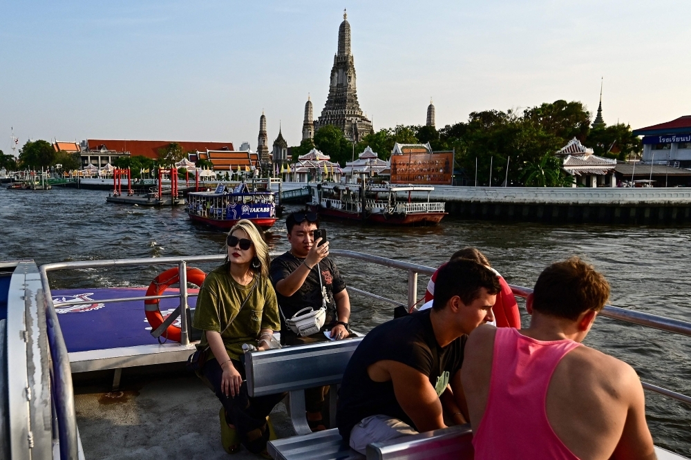 Thailand introduces digital arrival card for foreign visitors from May 1 Spokesman for the Ministry of Foreign Affairs, Nikorndej Balankura, said the TDAC, an electronic arrival card, will replace the disembarkation card, also known as the TM6 card. — AFP pic