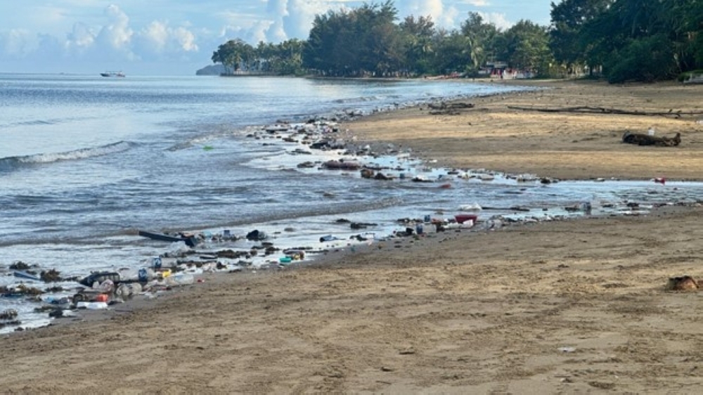 Trash trouble in Sabah: Waste, pests and health risks plague tourist hotspots One of the coastal areas littered with garbage. — The Borneo Post pic