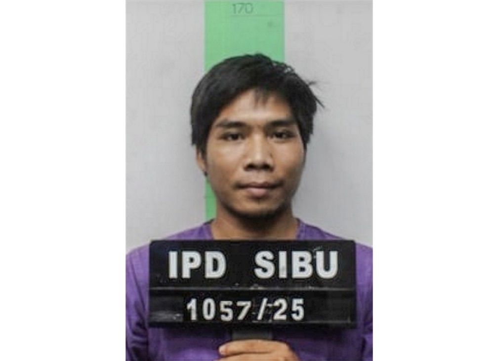 Sibu police launch manhunt after rape suspect escapes in handcuffs and purple lockup uniform Police have launched a manhunt for an Indonesian detainee who escaped from the Sibu Central Police Station lockup yesterday. — Bernama pic