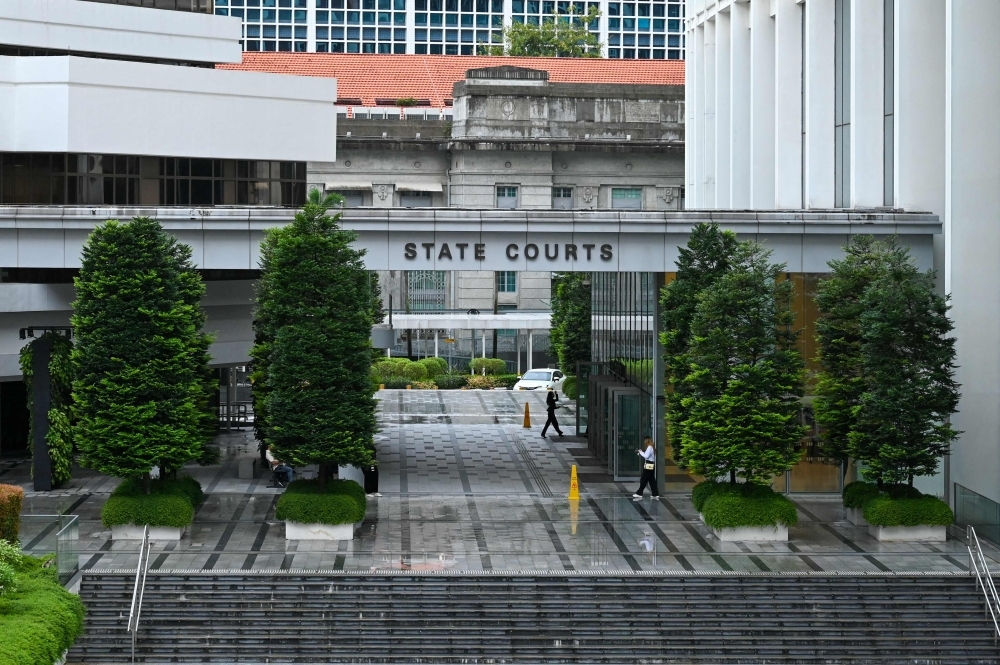Felicia Tay Bee Ling, 49, and Eric Ong Chee Wei, 50, misled the victim, David Tan, into believing he was investing in condominium units with high returns, while hiding the fact that most of the properties did not exist. — AFP file pic Felicia Tay Bee Ling, 49, and Eric Ong Chee Wei, 50, misled the victim, David Tan, into believing he was investing in condominium units with high returns, while hiding the fact that most of the properties did not exist. — AFP file pic