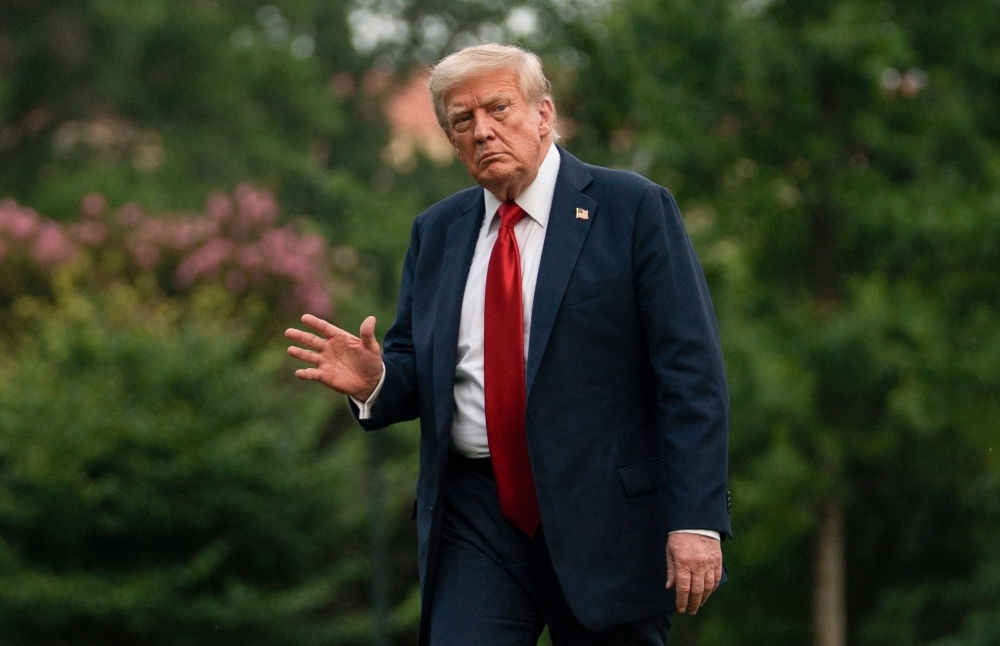 Trump says US to send Patriot missiles to Ukraine, slams Putin over continued attacks US President Donald Trump walks on the South Lawn upon arriving at the White House after attending the 2025 FIFA Club World Cup final in New Jersey. — AFP pic