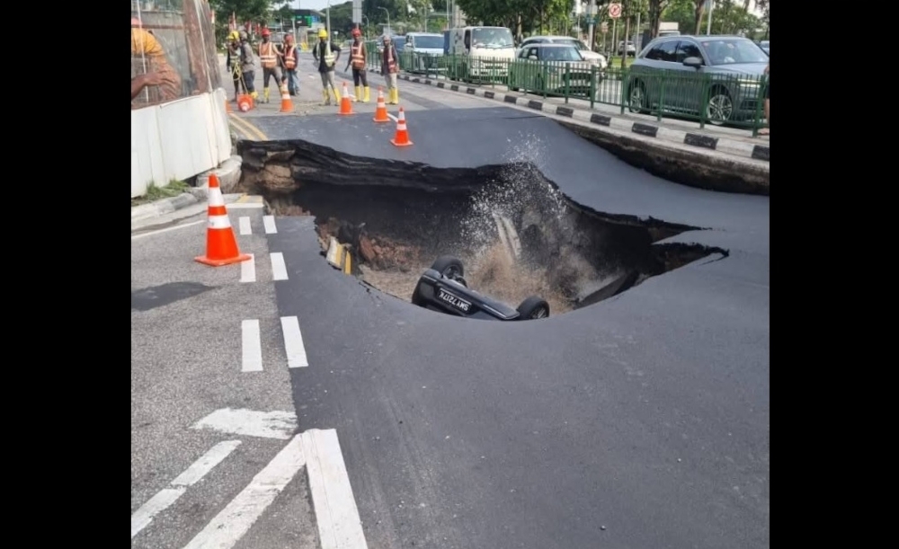 ‘Sinkholes don’t form overnight’: Singapore experts say warning signs often missed before Tanjong Katong collapse A sinkhole opened along Tanjong Katong Road South at around 5.50pm on July 26, submerging a car in water. One person was taken to hospital. — Picture from Facebook/SG Warehouse Sale & Events