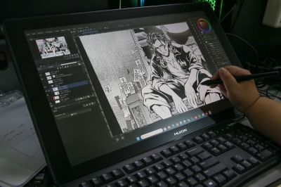 Manga with a Malaysian soul: How Rise Production blends local folklore with Japanese style and modern storytelling A Rise Production artist sketching a character on a Huion Kamvas device. — Picture by Yusof Mat Isa