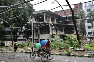 ‘Symbol of fascism’: Ex-PM Hasina’s former palace becomes museum of protest in post-revolution Bangladesh In this photograph taken on July 31, 2025, people move past the damaged Bangabandhu Memorial Museum, which was once the residence of Sheikh Mujibur Rahman, Bangladesh's first president and father of the country's ousted Prime Minister Sheikh Hasina, in Dhaka. — AFP pic