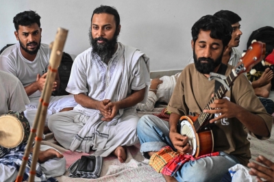 A tradition for centuries, Sufi singers face threats as hardline Islamists gain ground in post-Hasina Bangladesh In this photograph taken on July 15, 2025, Faisal Enayet (second left), a marketing graduate and Sufi music enthusiast, attends a spiritual gathering in Bangladesh's Kushtia. — AFP pic