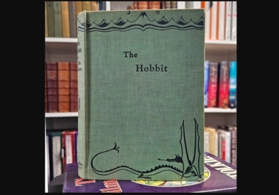 Rare first edition of ‘The Hobbit’ unearthed in UK heads to auction, early bid hits nearly RM130,000 The copy is bound in light green cloth and features rare black-and-white illustrations by Tolkien, who created his beloved Middle Earth universe while he was a professor at the University of Oxford. — Picture from Facebook/Auctioneum - Bristol & Bath Auctioneers
