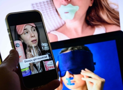 Obsessed with perfect sleep? Experts warn viral ‘sleepmaxxing’ craze may worsen insomnia, anxiety This photo illustration taken in Washington, DC, on July 14, 2025, shows images on the internet and social media of