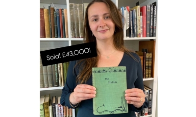 Tolkien treasure: Rare ‘Hobbit’ first edition discovered in UK home sells for record-breaking RM241,000 Auctioneum rare books specialist Caitlin Riley poses with the first edition of JRR Tolkien’s ‘The Hobbit’ that was sold for £43,000 (RM241,087) at auction. — Picture via Facebook/Auctioneum - Bristol & Bath Auctioneers