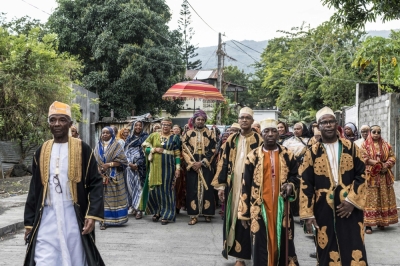 Diaspora returns for Comoros’ lavish ‘Grand Mariage’, a rite of passage that unites generations and communities Franco Comoran Faid Kassim (centre), 42, who lives with his wife Faizat Aboubacar in Reunion, walks under an umbrella surrounded by family members in Moroni on July 20, 2025 while heading to his bride's family house during the Grand Mariage ceremony. The Grand Mariage, called Dola n'kou in Comorian, corresponds to a rite of passage from one generational group to the next: as in most Bantu societies, Comorian society is organised according to age groups and various merits or rituals performed. The Grand Mariage is the last of these rites of passage. — AFP pic