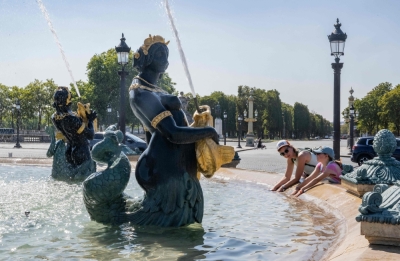 ‘Silent Killer’: Experts reveal the underestimated dangers of rising global heatwaves A woman and a child cool their hands in the Fontaine des Mers fountain spraying water at the Place de la Concorde in Paris on August 11, 2025, amid a heatwave in Europe. — AFP pic