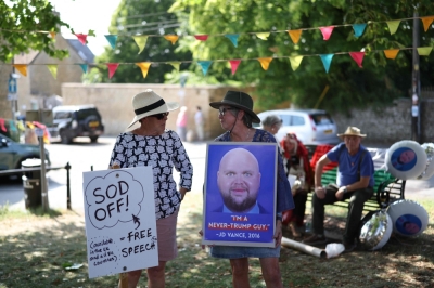 JD Vance goes on holiday, gets the great British ‘sod off’ Demonstrators pose with placards at a ‘Vance not welcome party’, organised by Stop Trump Coalition supporters and local residents in  Charlbury, west of London on August 12, 2025, as the US Vice President JD Vance takes his vacation in the English countryside. — AFP pic