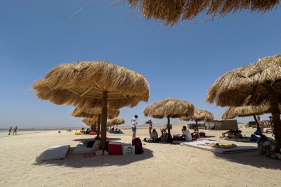 ‘Save Hankorab’: The fight to protect one of the Red Sea’s last wild shores People sit in the shade of parasols at the Ras Hankorab beach in the Red Sea Wadi Al-Gemal protectorate in southern Egypt on May 28, 2025. — AFP pic