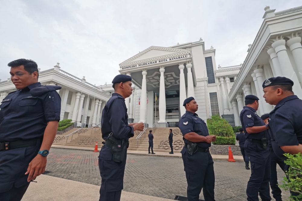 Honour court’s dignity and rule of law, Sabah Law Society says amid Zara Qairina’s bullying trial involving minors Security personnel stood guard outside the Kota Kinabalu Court Complex as five underage girls were scheduled to be charged in the Juvenile Court this morning over the bullying case involving student Zara Qairina Mahathir. — Bernama pic