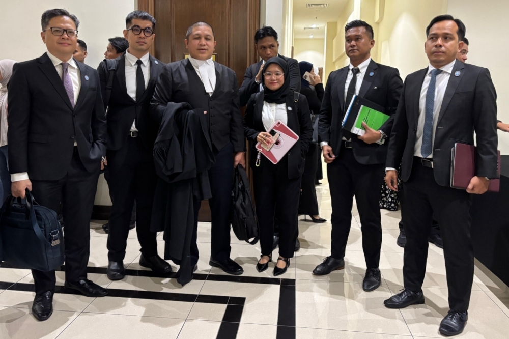 Lawyer confirms gag order in bullying trial of late Zara Qairina at Kota Kinabalu Children’s Court The lawyers representing Zara Qairina Mahathir’s family, led by Hamid Ismail (third left) before entering the Children’s Court for the bullying case charge against five teenagers. — Picture by Julia Chan
