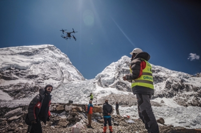 Drones take on Everest’s garbage In this handout photograph taken on May 11, 2025 and released by Airlift Technology, a man operates a heavy-lift drone to clear trash dumped at the Everest Base Camp. — Airlift Technology handout via AFP