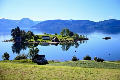 World’s first commercial CO2 ‘graveyard’ opens in Norway A tractor collects hay in a field near Omaholmen Island in Omastranda, Norway on August 23, 2025. Norway will host the world's first CO2 'graveyard. — AFP pic
