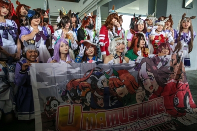 ‘Harikitte ikou, Torena-san!’ Umamusume fans, cosplayers to rally for upcoming Merdeka Cup horse race Pretty Derby fans and cosplayers posing for a group photo at AniManGaki 2025 held at the Mines International Exhibition and Convention Centre in Seri Kembangan August 24, 2025. — Picture by Yusof Isa
