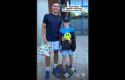 Tennis player Kamil Majchrzak rights the wrong after viral US Open cap theft incident, reunites with young fan in touching gesture Kamil Majchrzak with Brock. — Picture via Instagram/Kamil Majchrzak