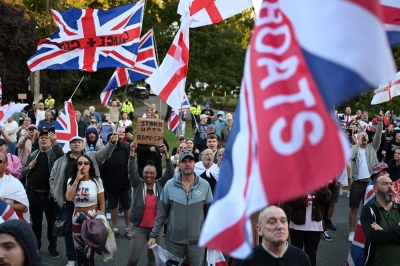 Protests erupt again at Essex hotel as UK debate over migrant accommodation intensifies Protesters calling for the closure of The Bell Hotel which houses asylum seekers, gather outside the council offices in Epping August 31, 2025. — AFP pic