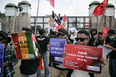 ‘People are angry’: Thousands rally across Indonesia as military rolls into Jakarta after deadly protests University students protest as they demand police reform in front of the main entrance gate of the parliament complex in Jakarta on September 1, 2025. — AFP pic