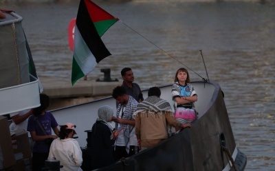 Gaza flotilla with Greta Thunberg resumes voyage after weather setback in Barcelona Swedish climate activist Greta Thunberg (right) is seen on board of a vessel of a civilian flotilla, carrying pro-Palestinian activists, and humanitarian aid and aiming to break the Israeli blockade of the Gaza Strip, remains moored at Barcelona port on September 1, 2025, after being forced to return due to bad weather. — AFP pic