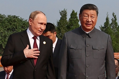‘People could get younger’: Open mic caught Xi, Putin discussing immortality In this pool photograph distributed by the Russian state agency Sputnik, Russia’s President Vladimir Putin (L) walks with China’s President Xi Jinping before a military parade marking the 80th anniversary of victory over Japan and the end of World War II, in Beijing, Tiananmen Square September 3, 2025. — AFP pic