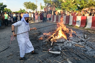 Bangladesh police launch manhunt after riot over cleric's grave Men exhumed and burned Nurul Haque’s shrouded corpse through a street in Rajbari district on September 6, 2025. — AFP pic