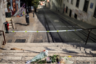 Lisbon funicular cable disconnected before crash that killed 16, inspectors say Flowers and tributes are pictured up the stairs at the site of the Gloria funicular accident after the wreckage was removed in Lisbon on September 5, 2025. — AFP pic