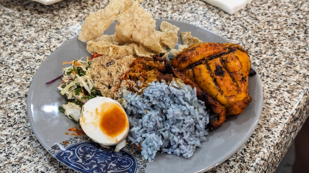 Kelantan classics like ‘nasi kerabu’, ‘budu’ among 213 dishes now recognised as National Heritage ‘Nasi kerabu’ with ‘ayam bakar’. — Picture by Ethan Lau