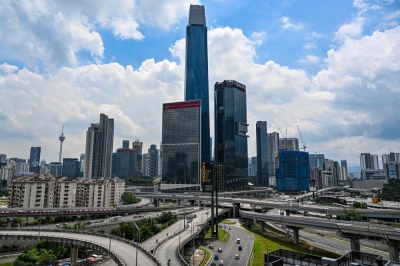 Want to shape KL’s skyline? TRX is calling on artists to design its next landmark The Tun Razak Exchange tower (centre, back) is pictured with other commercial buildings in Kuala Lumpur on May 15, 2024. Artists and students are being invited to leave their mark on the Tun Razak Exchange (TRX) through a public sculpture competition aimed at capturing the spirit of Kuala Lumpur as a global hub rooted in local identity. — AFP pic