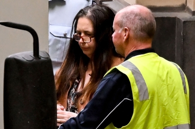 Australia’s ‘Mushroom murderer’ jailed for life over fatal lunch that shocked the world Convicted killer Erin Patterson (L) leaves the Supreme Court of Victoria in Melbourne on September 8, 2025. — AFP pic