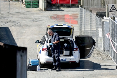 New Zealand father who kidnapped kids shot dead after four years on run A police officer investigates at a site following a shootout that occurred near the town of Piopio, located in New Zealand's Waikato region on September 8, 2025. — AFP pic