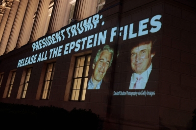 Trump denies writing lewd Epstein birthday note, calls it ‘nonsense’ An image of US President Donald Trump (right) and Jeffrey Epstein, along with the words “President Trump: Release All the Epstein Files”, is projected onto the US Department of Commerce headquarters in Washington, DC, on July 18, 2025. — AFP pic