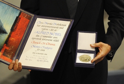 Nobel Committee rebuffs Trump’s campaign as Peace Prize decision nears Nobel Peace Prize laureate and US President Barack Obama poses on the podium with his diploma and gold medal during the Nobel ceremony at City Hall in Oslo on December 10, 2009. — AFP pic