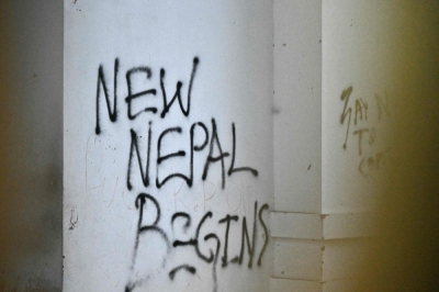 Rage against inequality: Why Nepal’s symbols of power were burnt, and its young keep leaving for jobs in Malaysia Graffiti is seen on the wall of the Singha Durbar, the main administrative building for the Nepal government, after it was set ablaze by protesters, in Kathmandu on September 11, 2025. — AFP pic